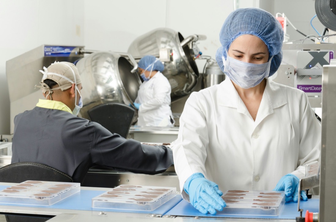 Workers in a food production plant